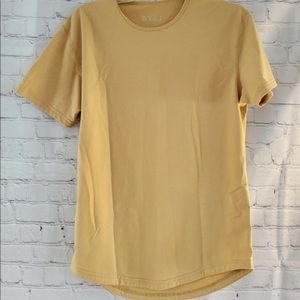 Bylt athletic shirt. Faded mustard color.